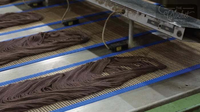 Yarn is streaming down in a circular format for steaming.
