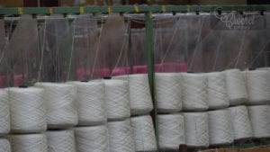 Industrial Yarn Cones Staged to Be Rolled into Skeins