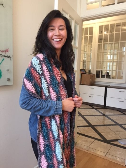 Shannon, wearing Bernat Velvet Scarf by Mikey