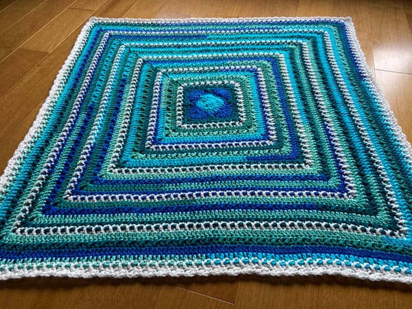 Baby on the O'Go Blanket by Jeanne Steinhilber