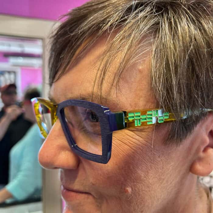 Karen Trying on New Glasses at Gaudet Optical