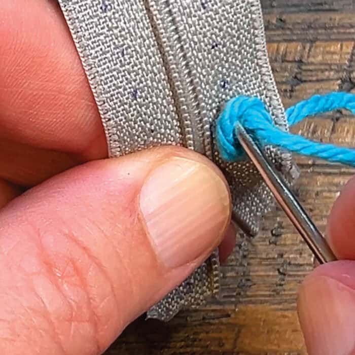 Attach Zipper to Yarn - Go Down Through Existing Loop and Into Same Hole