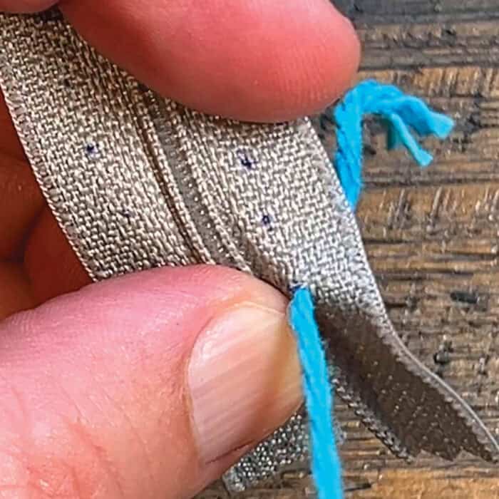 Attach Zipper to Yarn - Start from back through first hole