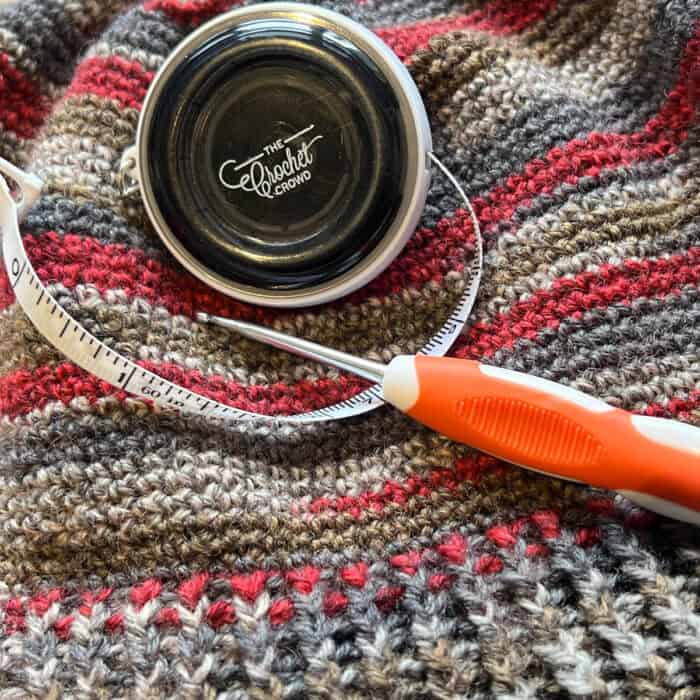 Mikey's Hands with Crochet Yarn Gauge