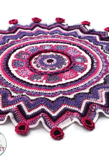 Colorful crochet boot cuffs with floral accents and intricate circular design. Perfect for stylish w.