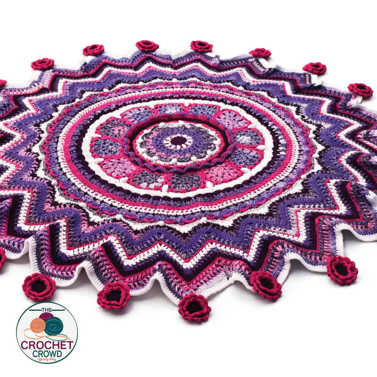 Colorful crochet boot cuffs with floral accents and intricate circular design. Perfect for stylish w.